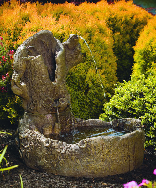 Frogs On Garden Stump Fountain Spouting Water